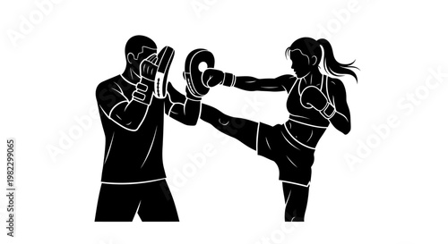 Female Muay Thai fighter practicing kick.