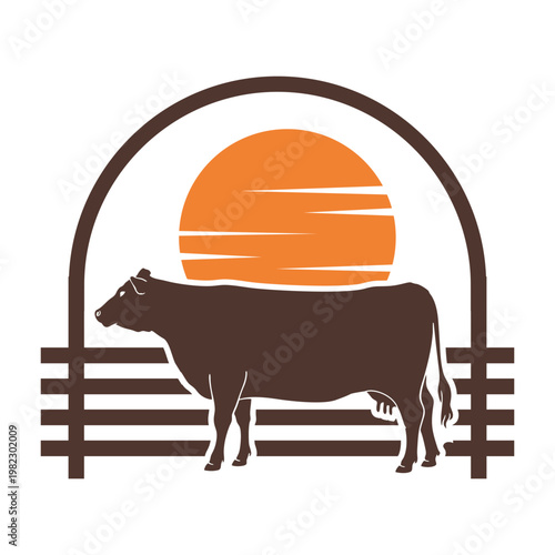 Angus Cow Silhouette in Farm Fence at Sunset
