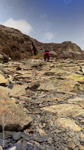 Hiker climbing Wrysgan Quarry Incline Tunnel, Eryri Snowdonia National Park, Blaenau Ffestiniog, Wales, UK