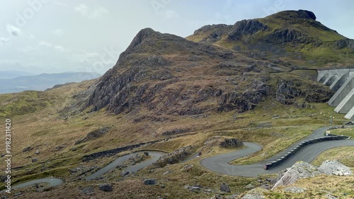 Winding Road to Stwlan Hydro Electricity Dam and Moelwyn Mountain, Snowdonia National Park, Blaenau Ffestiniog, Gwynedd, North Wales, UK