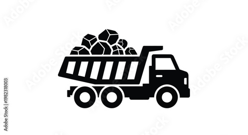 A black silhouette of a loaded dump truck transporting rocks