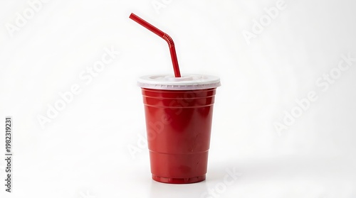 Red plastic disposable cup with white lid and red straw on white background