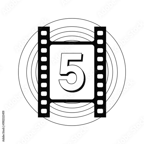 Film countdown five is displayed on a classic cinema leader strip used for movie production.