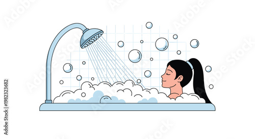 Happy woman relaxes in a bathtub filled with thick white soap bubbles while a shower head sprays water over her during her bath.