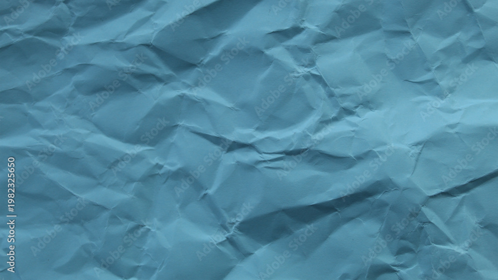 Obraz premium Light blue wrinkled paper texture, abstract background with soft folds and copy space