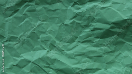 Foto Soft green wrinkled paper texture, abstract natural background with copy space