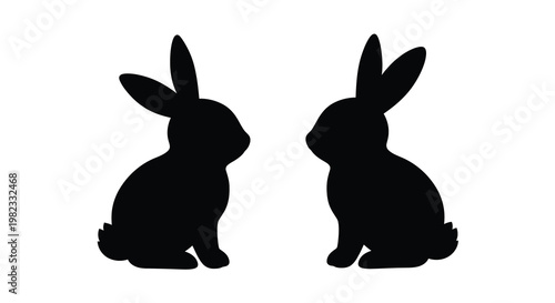 Two black rabbit silhouettes are facing each other on a white background