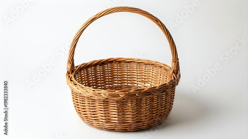 Handwoven basket with sturdy handle for everyday use or decoration isolated on white background