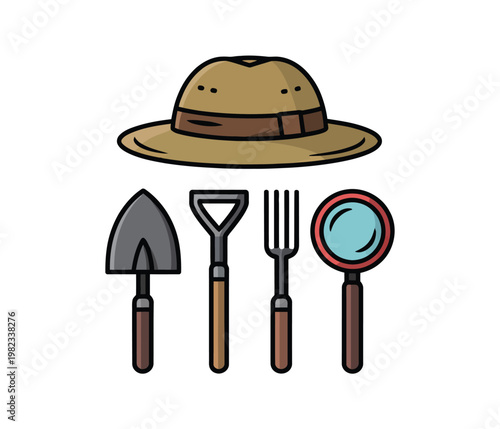 Gardening tools lie beneath a hat.