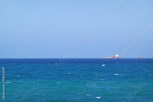 A lighthoise ah Horniga island, Cabo de Palos village, Spain