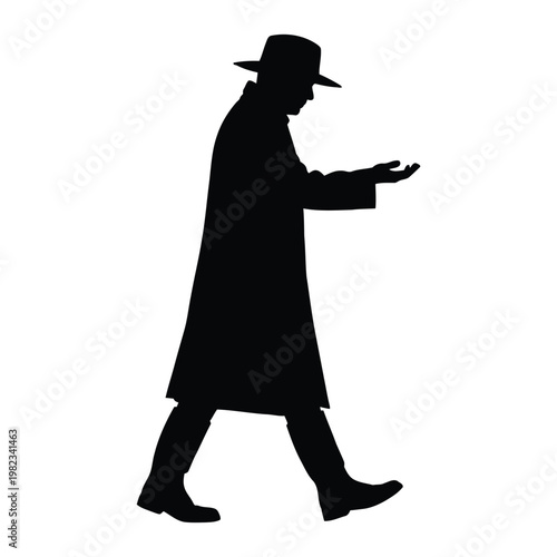 Man in a long coat and hat walking and gesturing with his hand