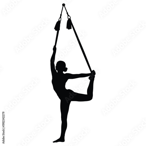 Yoga pose with hanging straps and one leg lifted high