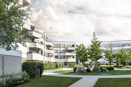 Cityscape of a residential area with modern sustainable apartment buildings, new green urban landscape in the city