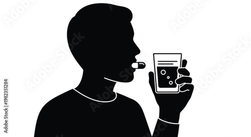 Silhouette of a person preparing to swallow a medical pill while holding a glass of clear water