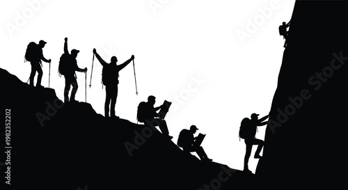 Mountain climbers silhouette celebrating success on a rocky peak