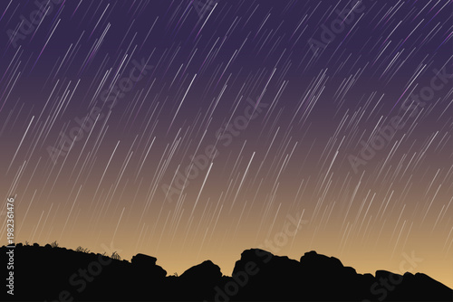 Yellow blue night sky, star trails. Landscape, rocky ground outline