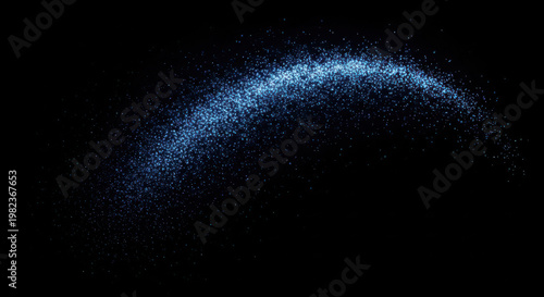 Blue light particles swirling on black background abstract.