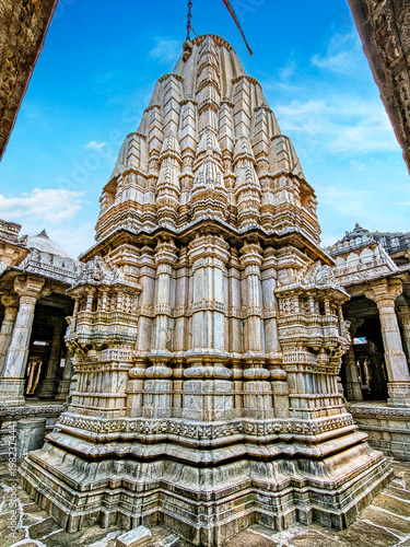 Ranakpur Jain Temple in Rajasthan, built in the 15th century and dedicated to Adinatha, is famed for its marble design, 1,444 unique pillars, symmetry, and serene spiritual ambiance.