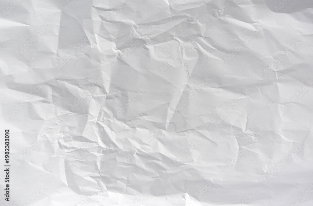Fototapeta premium White crumpled paper background, blank wrinkled sheet