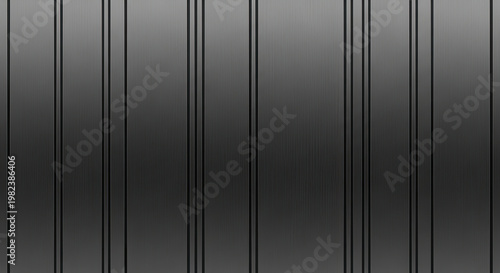 Dark gray metal wall paneling with vertical stripes creating an industrial design texture for modern architectural cladding dark metallic material