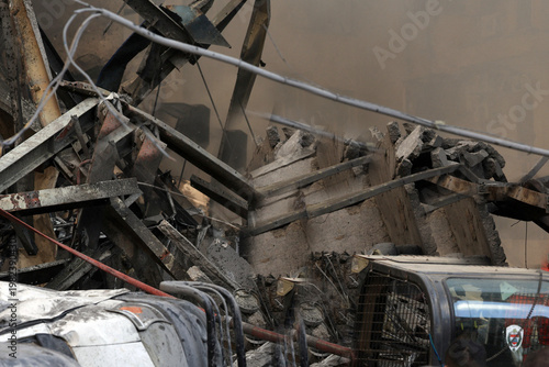 Beirut, Lebanon - April 10 2026: Rescuers work at the site of an Israeli strike searching through rubble and debris in the aftermath of the attack