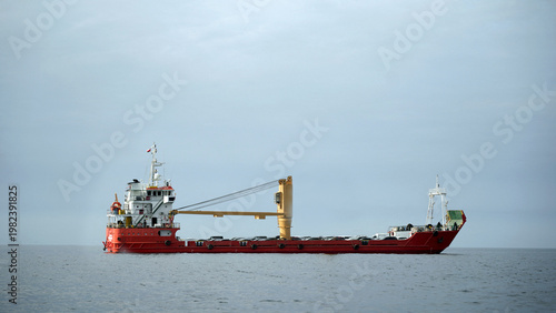 A vessel at the Strait of Hormuz off the coast of Oman showing maritime traffic and commercial shipping through the strategic waterway critical for global oil trade and energy transport