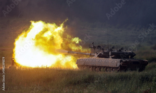 Iranian tank fires during war showing armored vehicle engagement and military combat operations with active artillery discharge