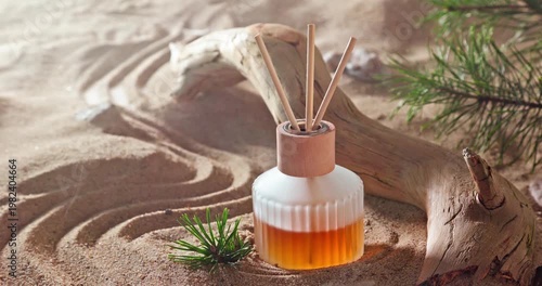 Intense fragrance diffuser on sandy beach in summer.