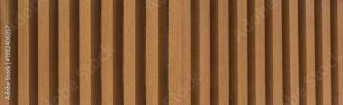 Schilderij op canvas Modern architectural background of vertical wooden slats with natural grain and depth