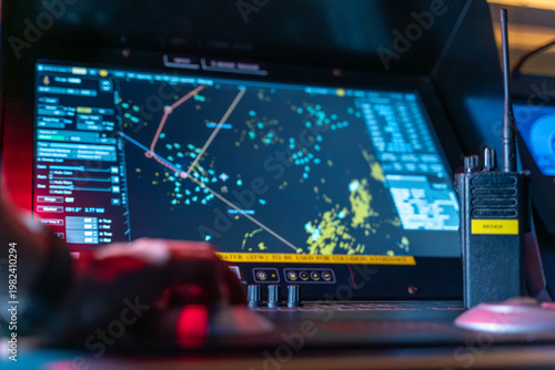 Foto Radar navigation screen and VHF radio on ship bridge console