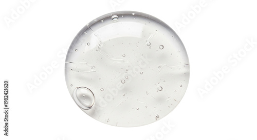 Texture swatch of glycerin gel transparent hyaluronic acid serum on white isolated background, macro Detergent, cosmetics, laboratory A round drop