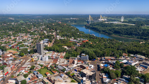 Obraz na płótnie Puerto Iguazú city skyline with triple border, Integration Bridge and ferris wheel