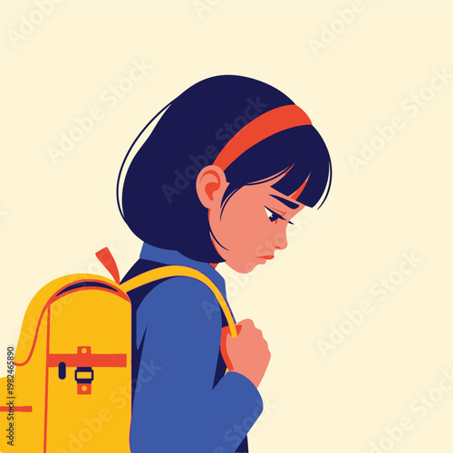 Young schoolgirl looking down with a sad expression and a yellow backpack