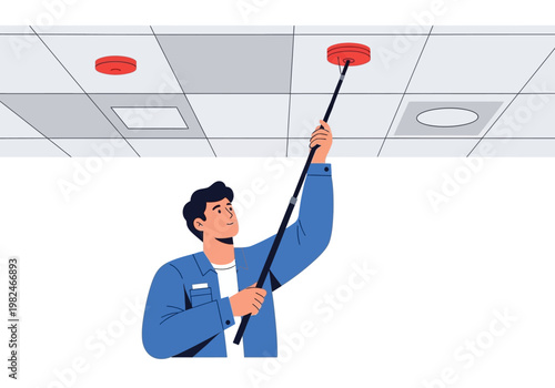 Man installing a ceiling smoke detector with a pole in an office building