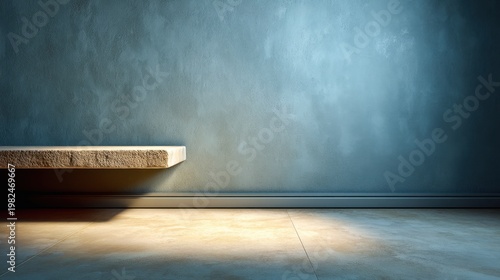 Minimalist Interior with Empty Blue Wall and Stone Shelf in Soft Lighting, Ideal for Contemporary Design Backgrounds or Display Purposes