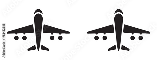 Two identical filled airplane icons, showcasing a commercial airliner from a top perspective.
