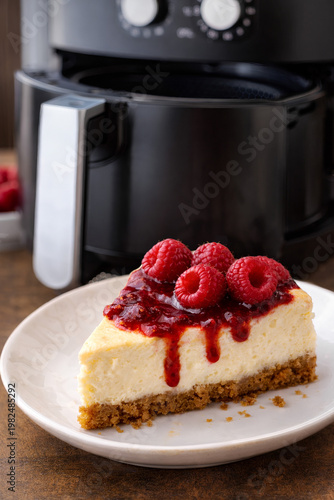 A slice of cheesecake with strawberry in airfryer.