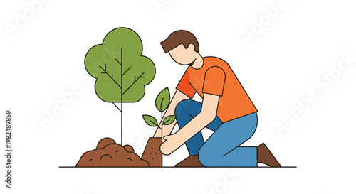 A young man planting a new tree sapling in the garden soil.