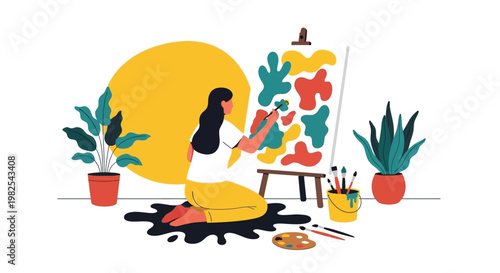 Young female artist kneeling while painting abstract organic shapes