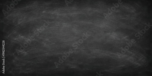 A distressed vintage chalkboard surface features a textured dark grunge backdrop with aged grey chalk marks and an empty black frame for a classic industrial design