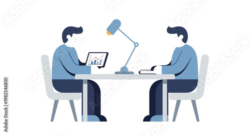 Two businessmen sit at a desk, one reviewing charts on a tablet while the other prepares to take notes under the light of a desk lamp.