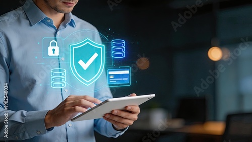 Businessman holding tablet with holographic cybersecurity icons data protection concept digital shield privacy secure network cloud storage modern office background technology
