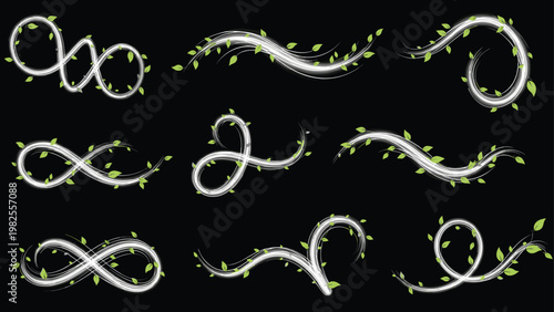 Elegant set of swirling silver ornamental vines decorated with small green leaves arranged in various decorative patterns on black.