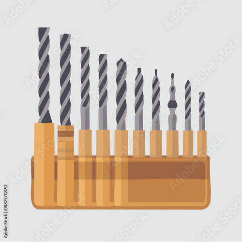 Set of assorted drill bits in orange plastic holder isolated on white