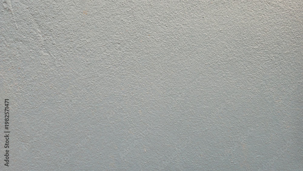 Fototapeta premium Smooth gray wall texture background with minimal clean surface. Light grey smooth paper texture background. Blank grey matte surface