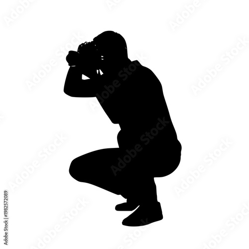 A man crouching down taking a picture with a camera Vector, illustration
