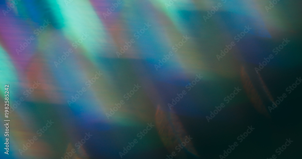 Fototapeta premium Blur flash leak. Lens prism. Colorful striped holographic light on dark background. Blue green purple luminosity abstract texture.