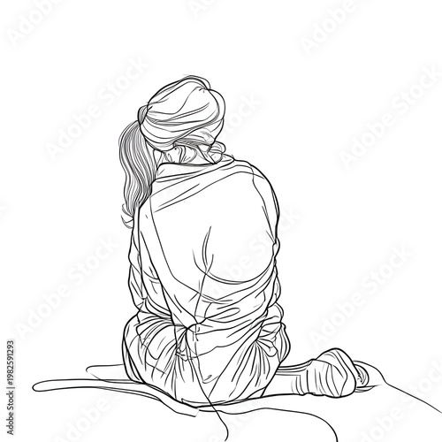 person hugging a blanket in emotional safety
