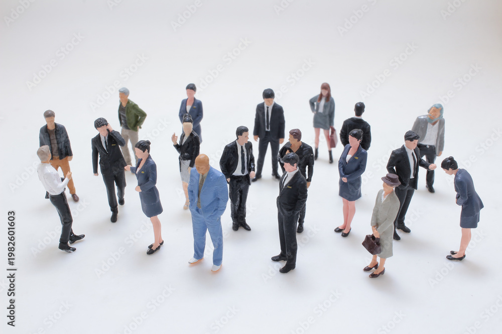 Obraz premium Group Of Miniature Business People Arrangement