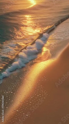 AIzaSyDgEIV5TQ7ClA84gHk1cKDLiL-3F7Hhpok A Serene Sunset Reflecting on the Ocean Waves and Sandy Shore